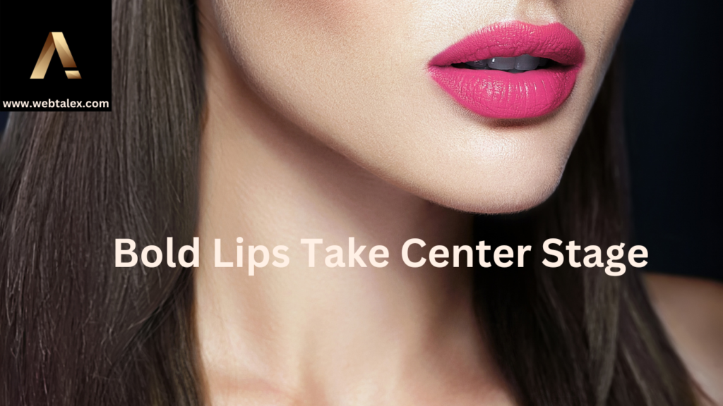 A young woman with striking, bold red lips and a confident smile.