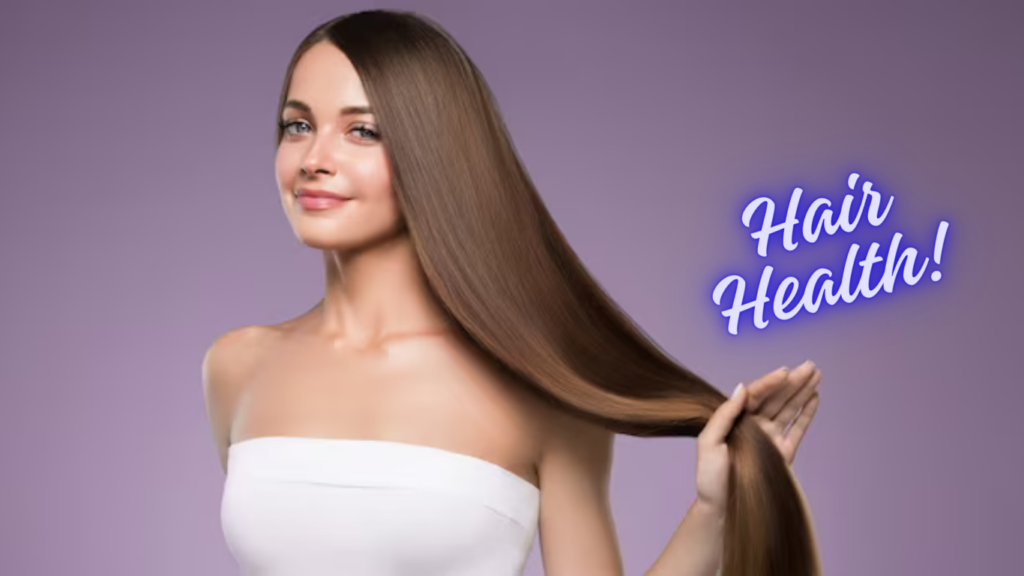 Beautiful woman with long, straight, and healthy hair, gently running her fingers through her smooth hair.